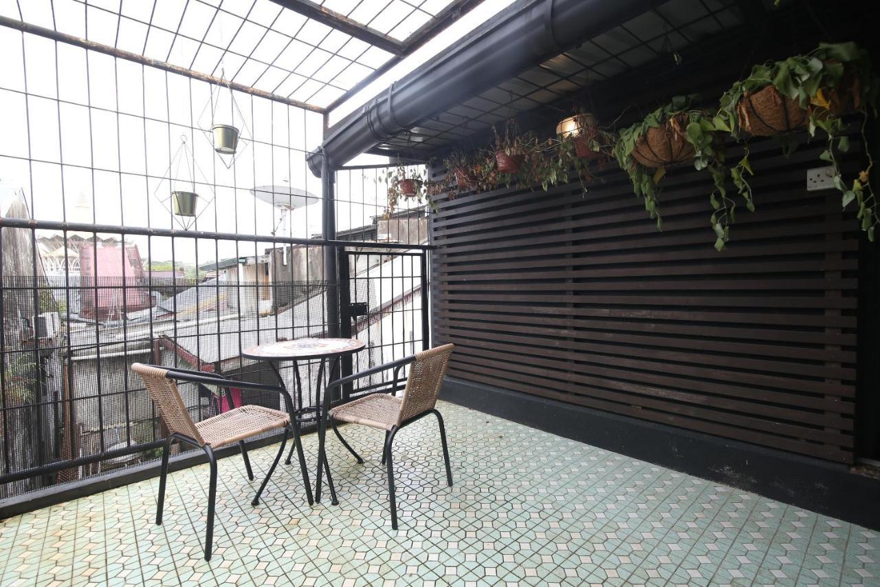 Spot On 90141 Threehouse Bed & Breakfast Kuching Eksteriør billede